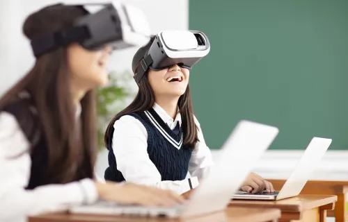 School children wearing a VR headset